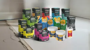 Kelmore adhesives and levelling compounds are displayed on a prepared subfloor