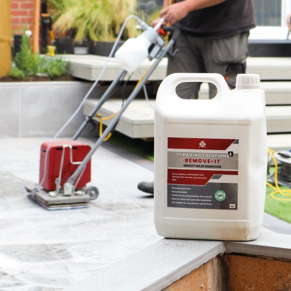 bottle of grout haze remover on a job site